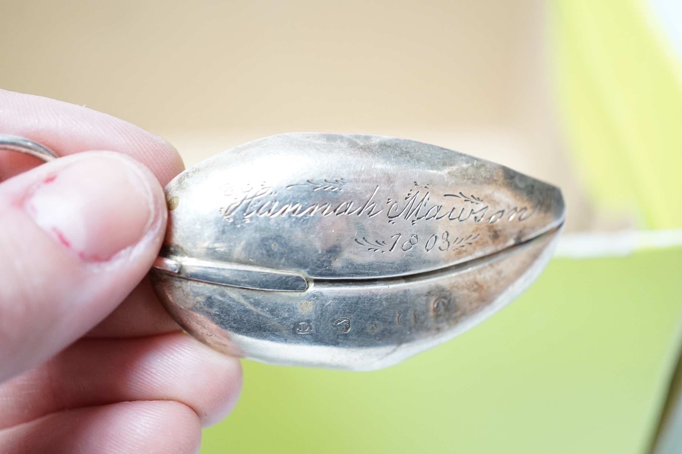 A silver sugar caster, serviette rings, a plated wine funnel, a Wedgwood biscuit barrel, etc.